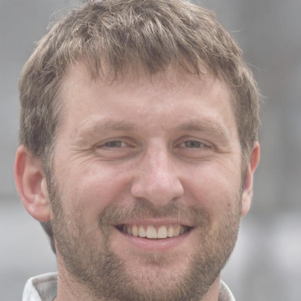 Professional headshot of Mikhail Volkov